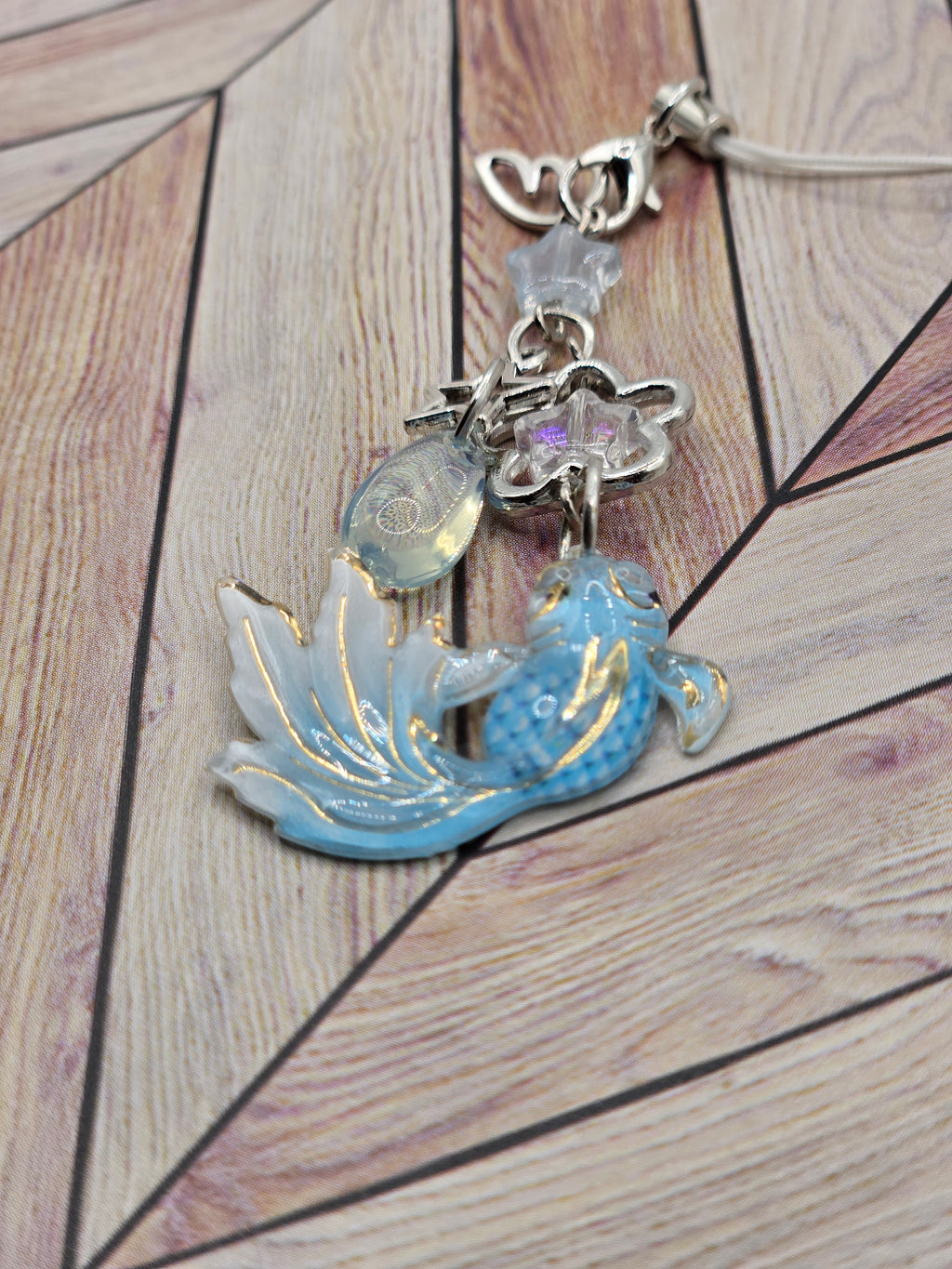 Celestial Koi Charm