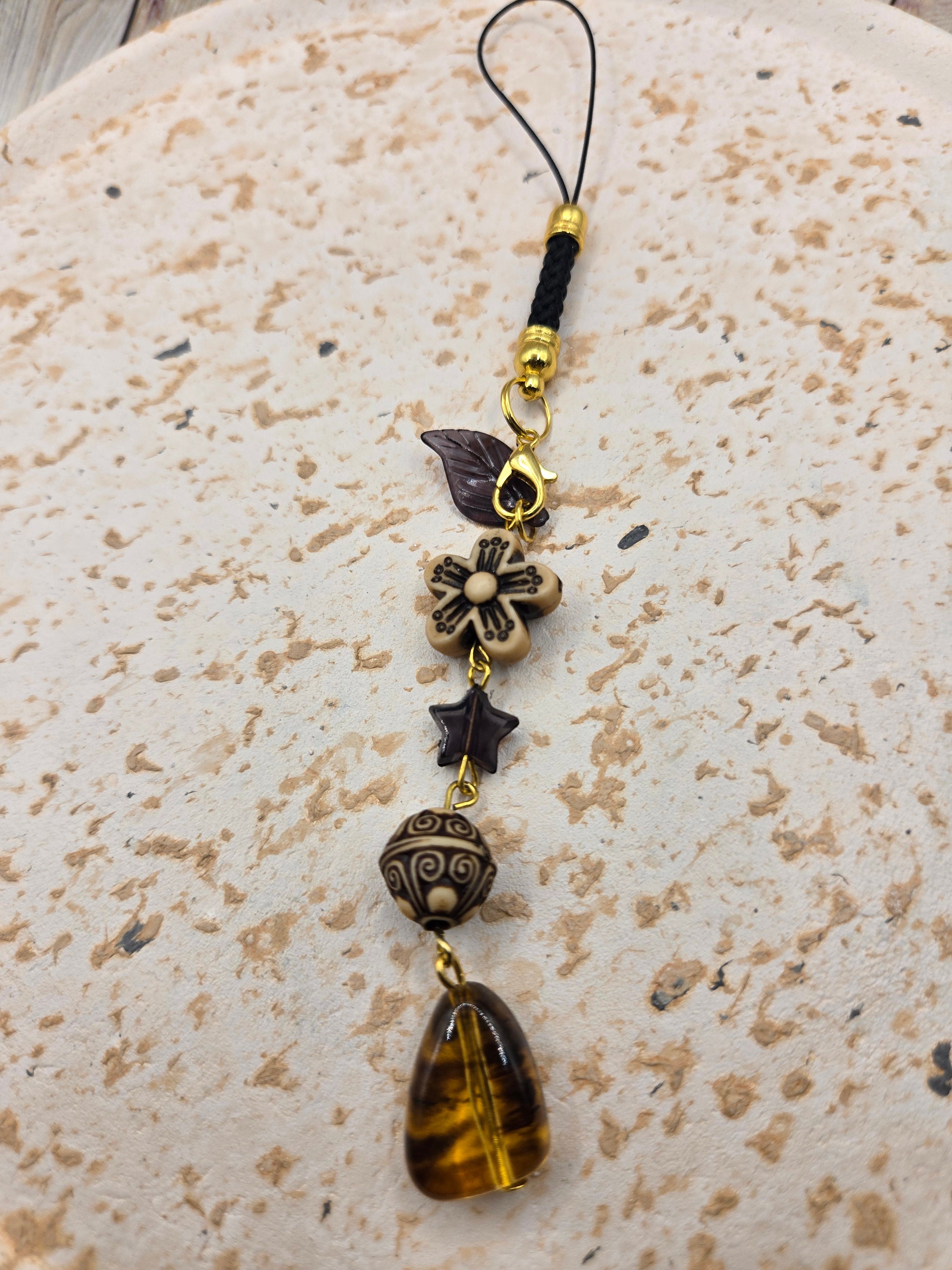 Golden Whisper Charm